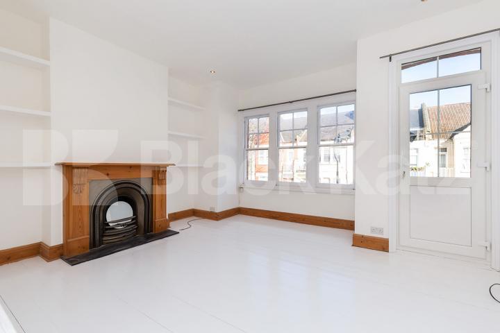 Set over three levels with high ceilings and exposed brickwork Rathcoole Gardens, Crouch End